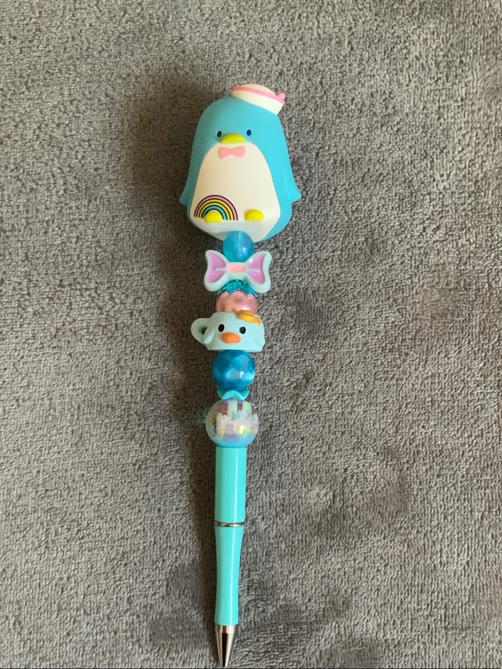 Blue Penguin Pen with Rainbow Accent